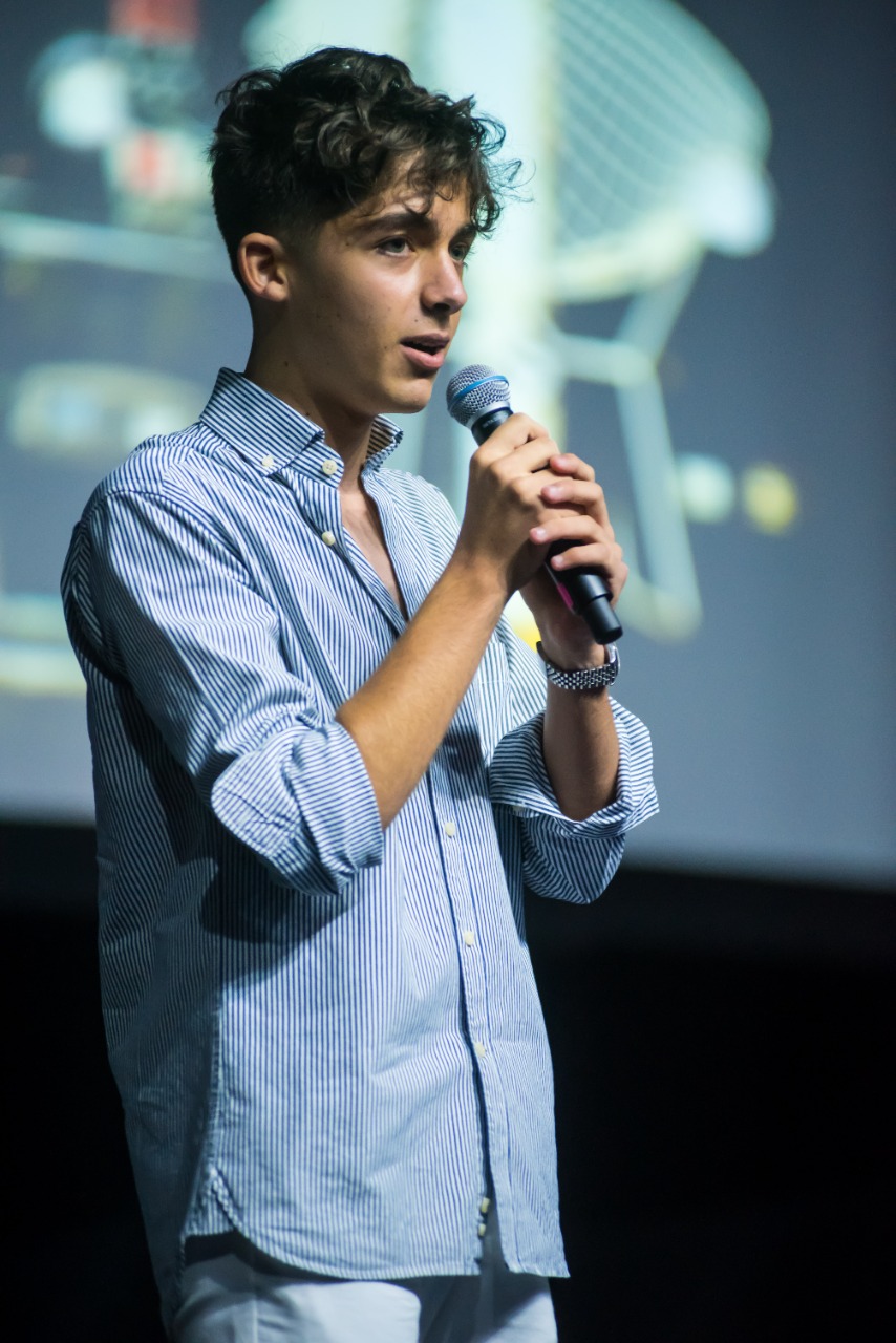 Efe Kelemci on stage for the first time, four years ago