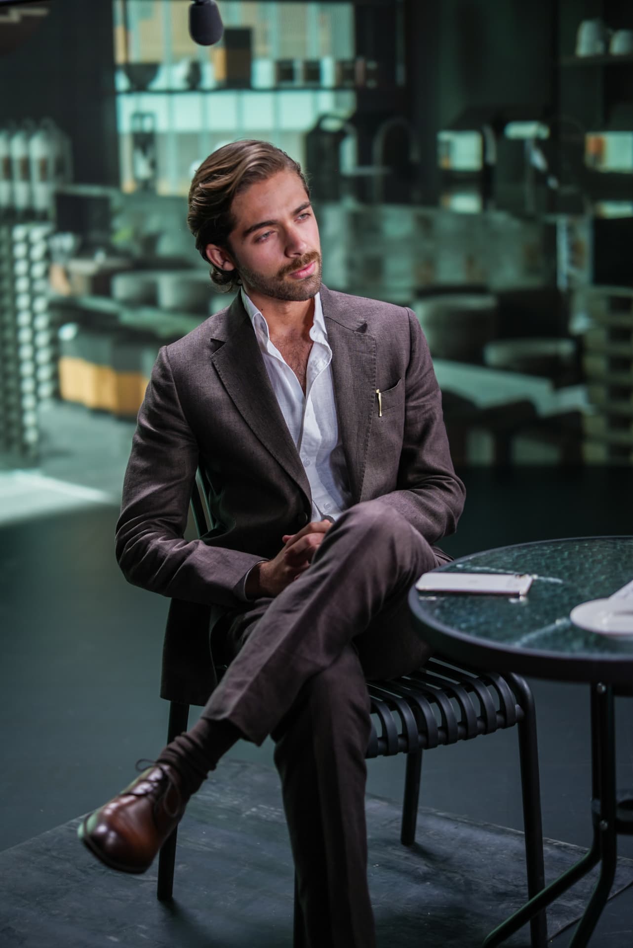 Efe Kelemci on set in character as Malcolm